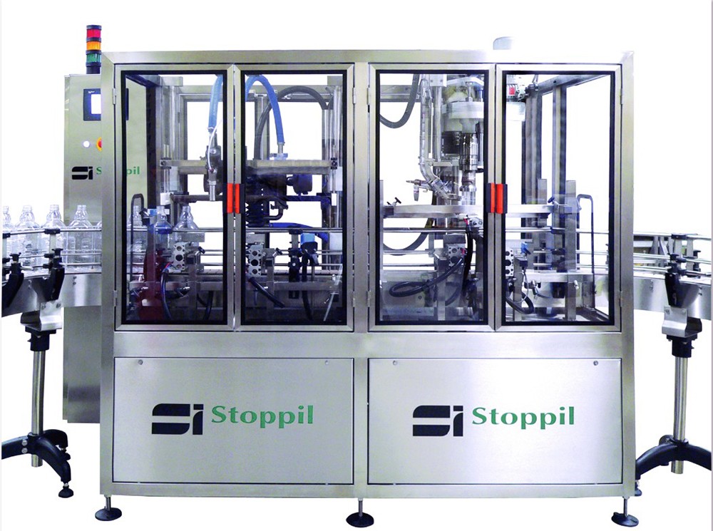 Automatic linear monobloc for filling and caping